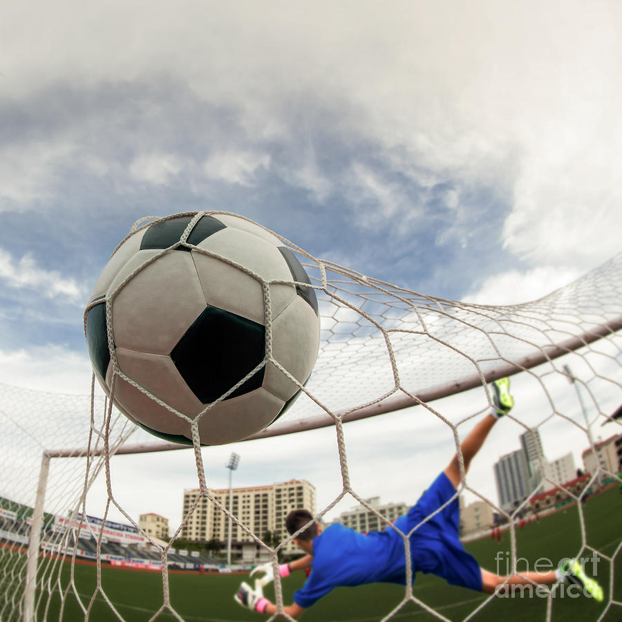 Soccer Ball In Goal  #4 Photograph by Anek Suwannaphoom