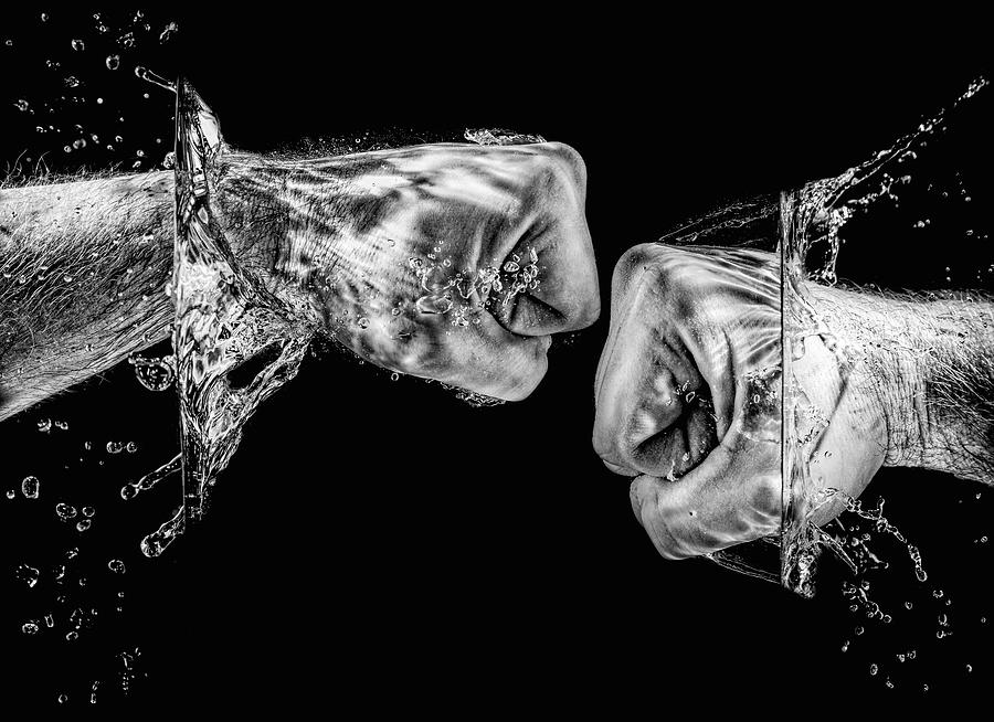 Splashing Fist #4 Photograph by Peter Lakomy