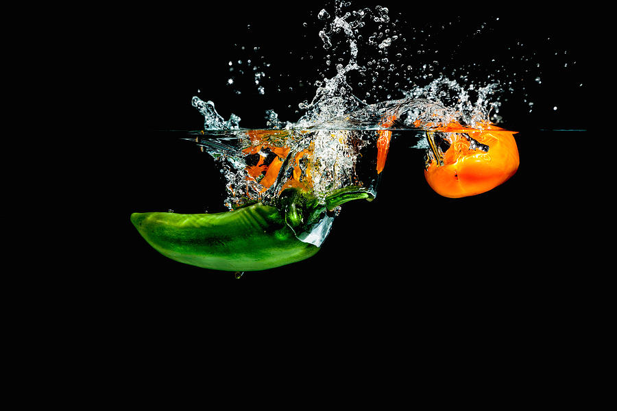 Splashing Paprika #4 Photograph by Peter Lakomy