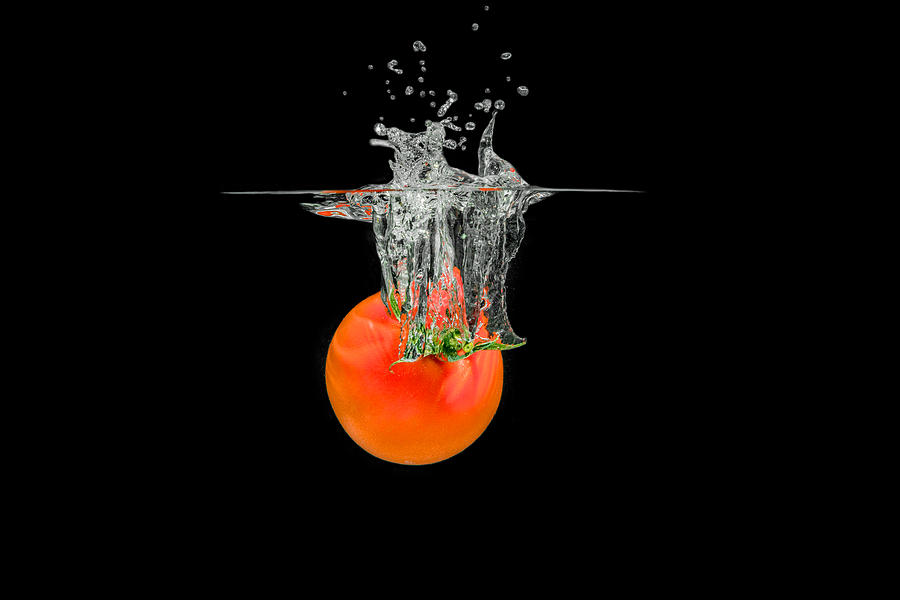 Splashing Tomato #4 Photograph by Peter Lakomy