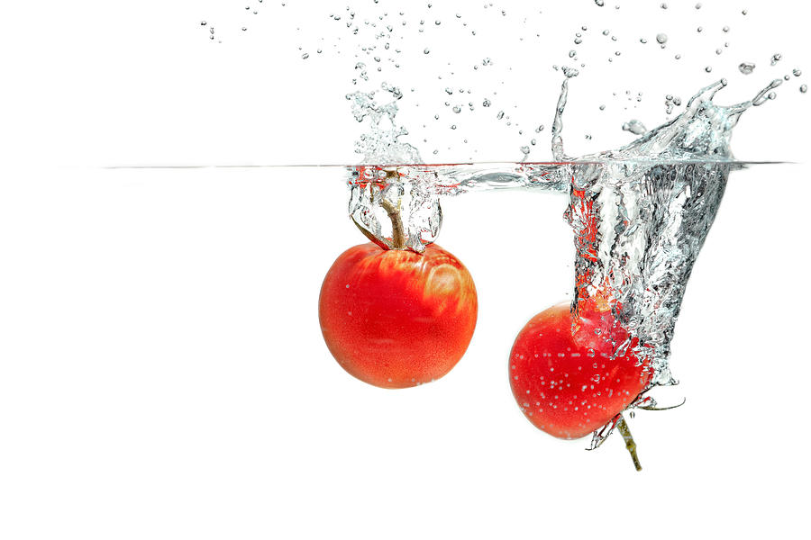 Splashing Tomatoes #4 Photograph by Peter Lakomy
