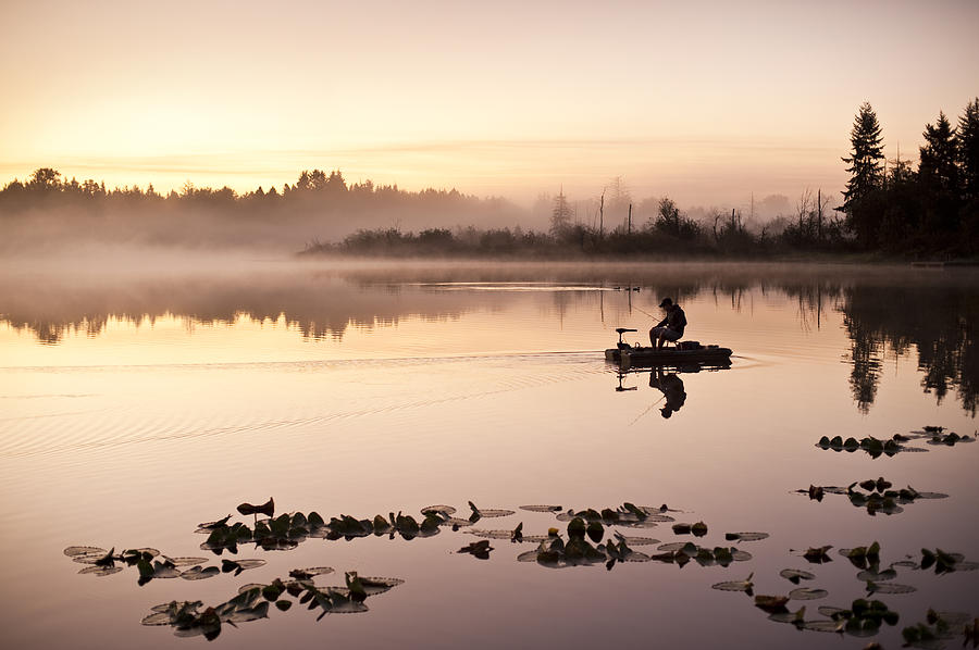 Sunrise in fog Lake Cassidy with fishermen in small fishing boat #5 Photograph by Jim Corwin