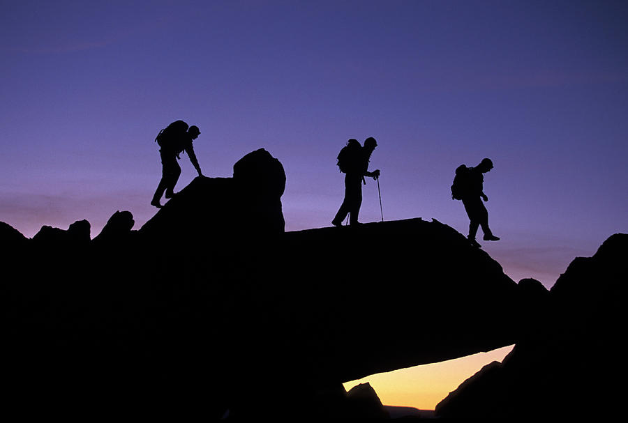 Three People Hiking In The Mountains Photograph By Corey Rich - Pixels