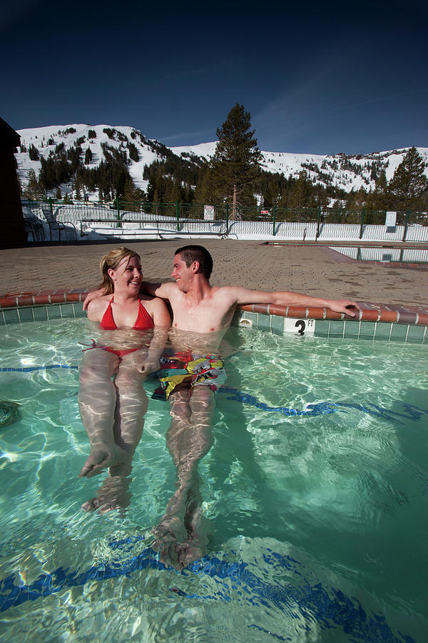 Mountain Photograph - Young Couple Relaxing In A Hot Tub #4 by Trevor Clark