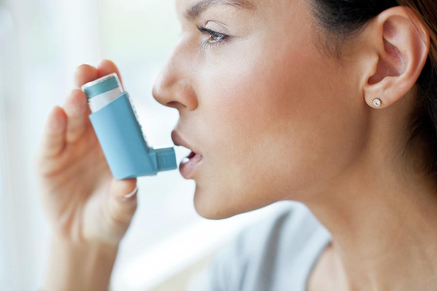 Young Woman Using Inhaler Photograph by Science Photo Library | Fine ...