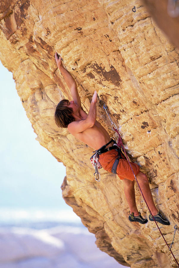 A Male Rock Climber Climbing Photograph By Corey Rich Fine Art America