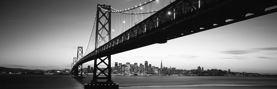 Bridge Across A Bay With City Skyline #5 Photograph by Panoramic Images