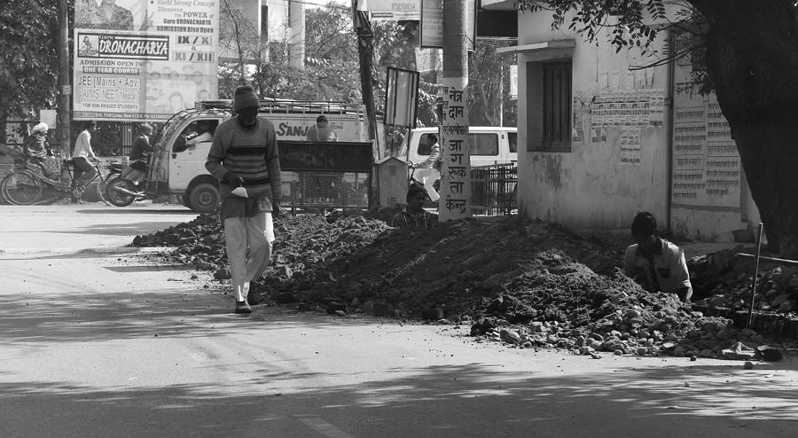 Digging a ditch at the side of a road in Roorkee #5 Photograph by Ashish Agarwal