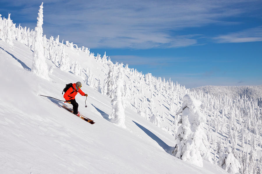 Male Skier Skiing On Snowy Landscape Photograph By Craig Moore - Fine 