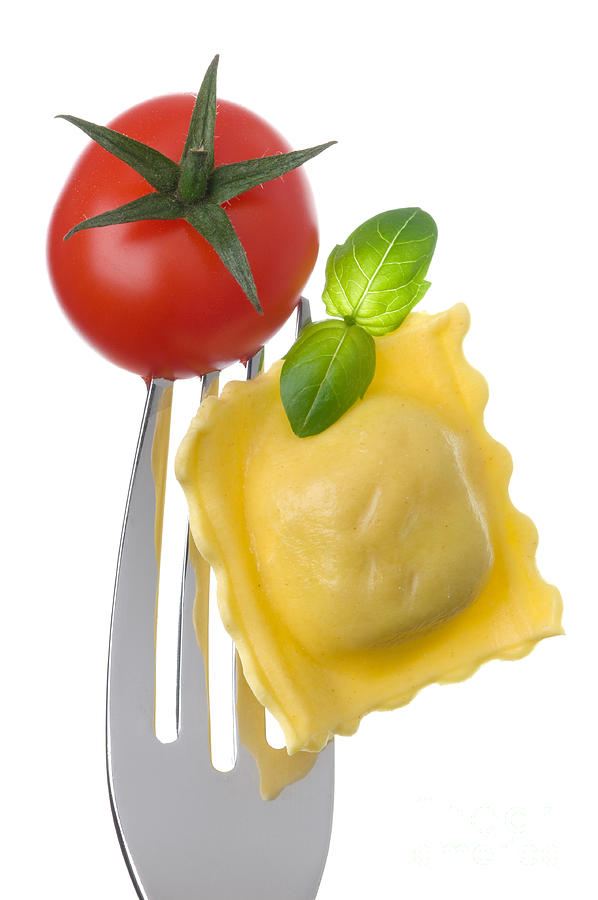 Ravioli Pasta Tomato And Basil On Fork Against White Background #5 Photograph by Lee Avison
