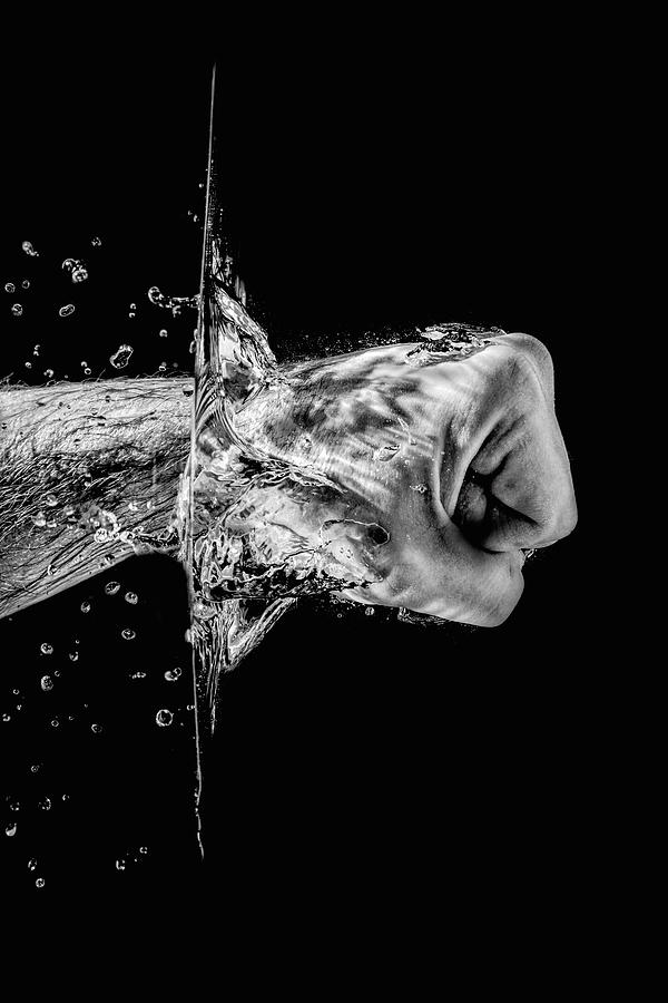Splashing Fist #5 Photograph by Peter Lakomy