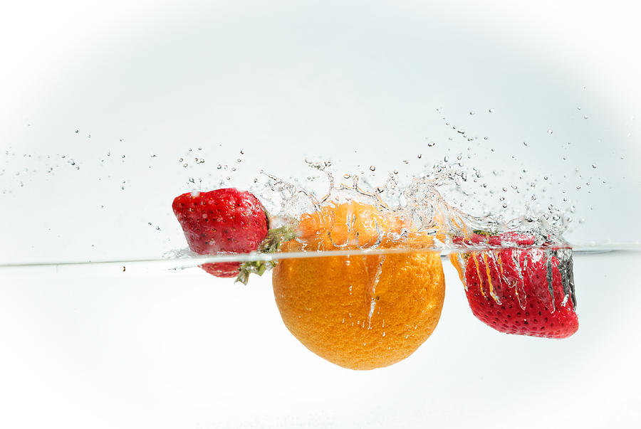 Splashing Fruits #5 Photograph by Peter Lakomy