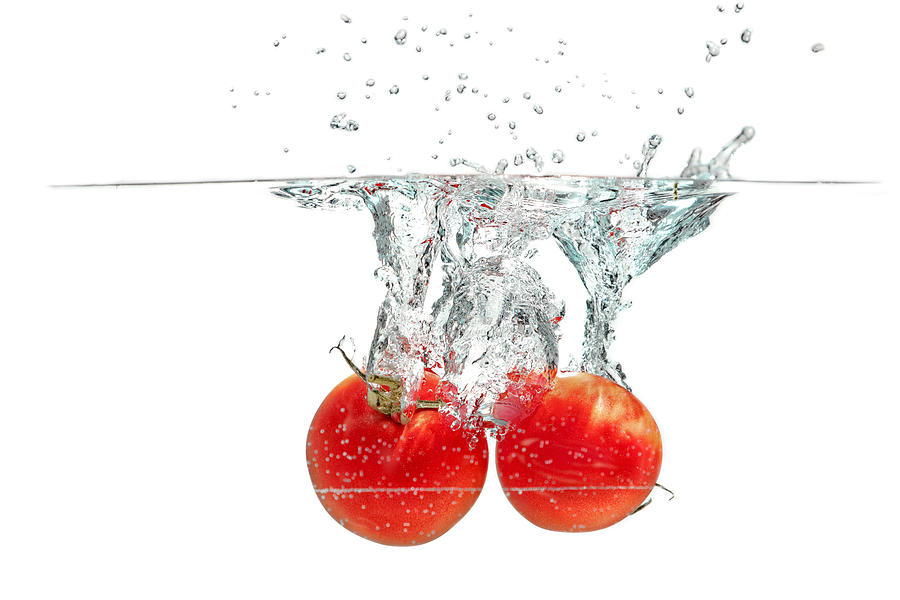Splashing Tomatoes #5 Photograph by Peter Lakomy