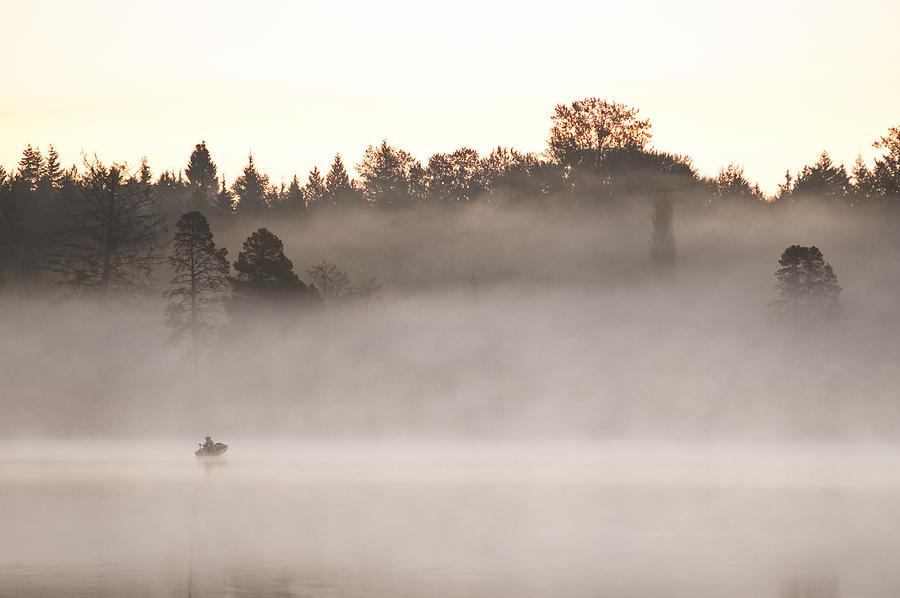Sunrise in fog Lake Cassidy with fishermen in small fishing boat #6 Photograph by Jim Corwin