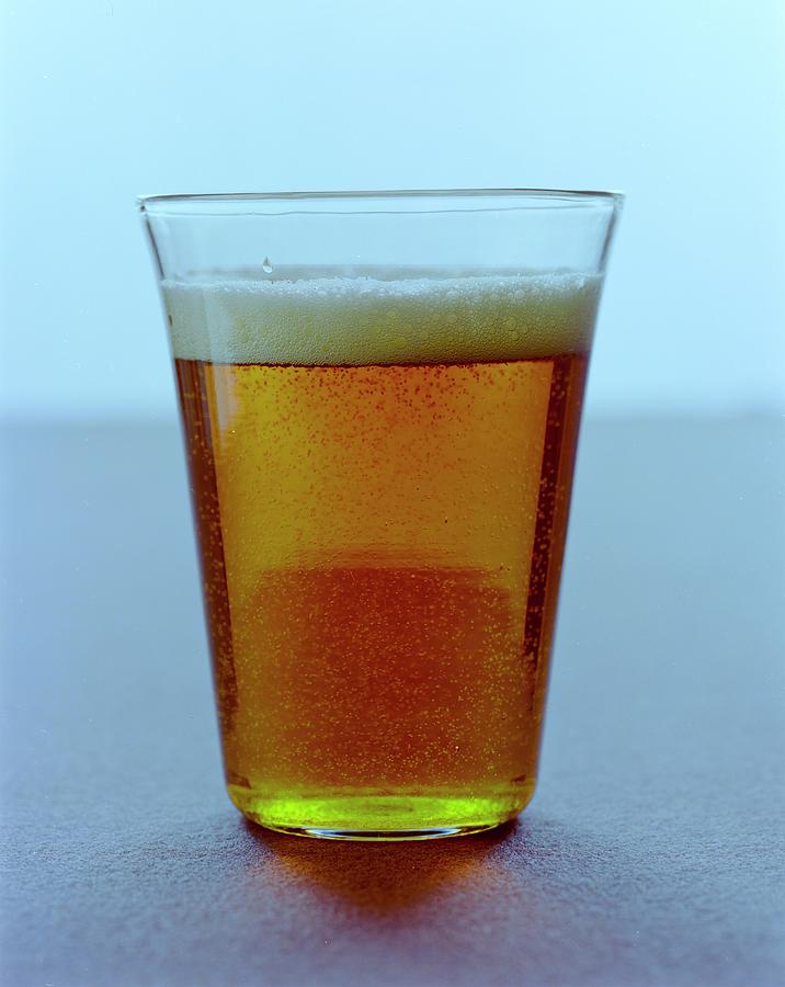 A Glass Of Beer Photograph by Romulo Yanes