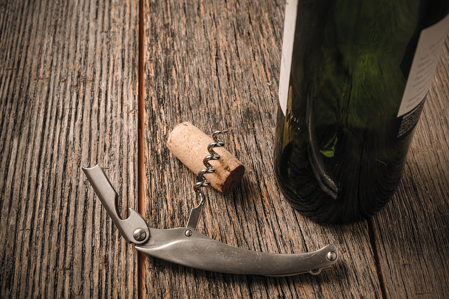 Wine Photograph - Green Wine Bottle and Cork with Red Wine and corkscrew #6 by Brandon Bourdages