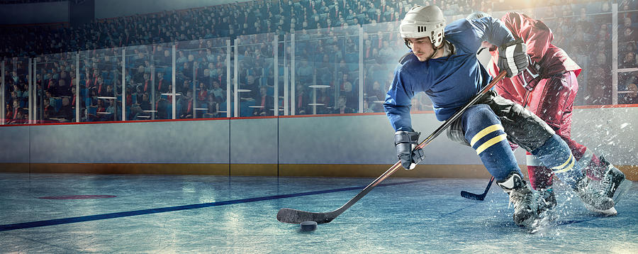 Ice hockey players in action #6 Photograph by Dmytro Aksonov