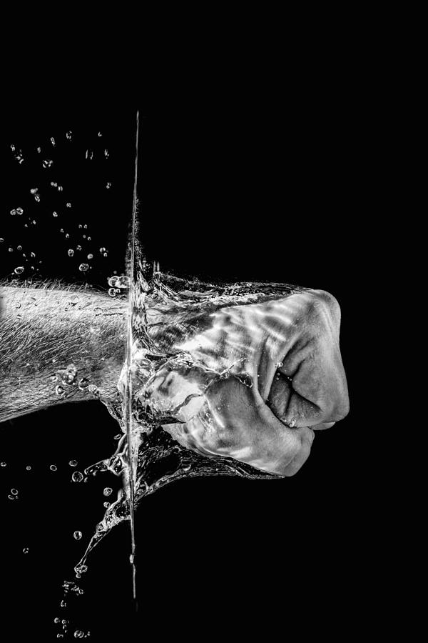 Splashing Fist #6 Photograph by Peter Lakomy