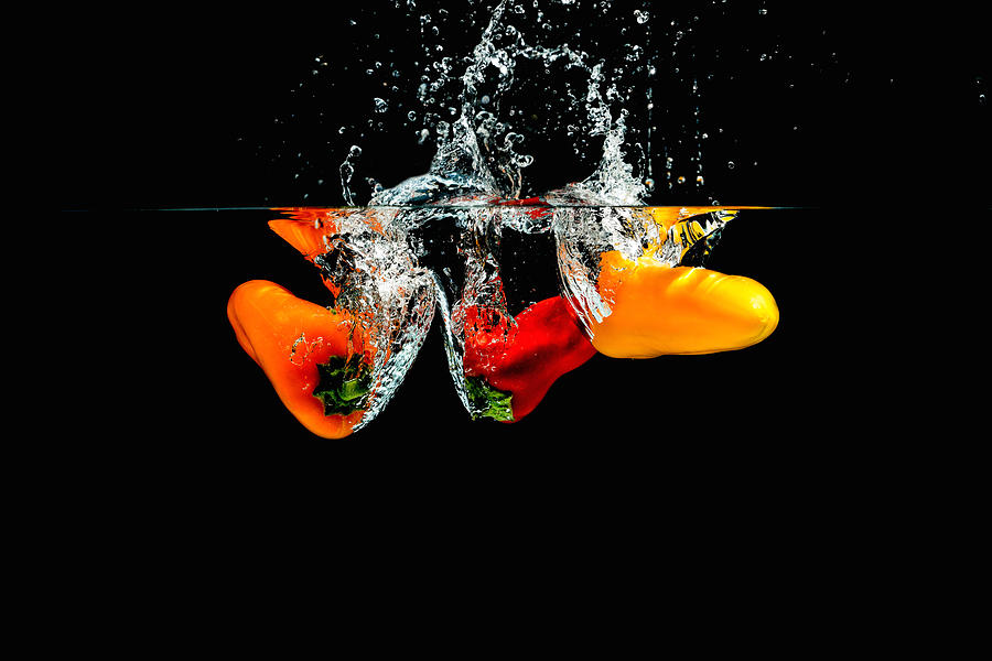Splashing Paprika #6 Photograph by Peter Lakomy
