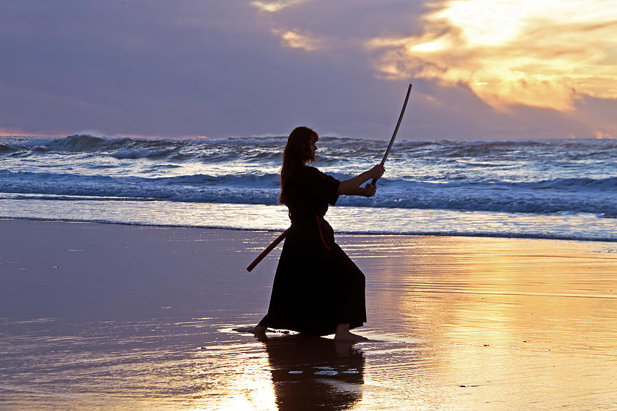 Young Samurai Women With Japanese Sword At Sunset On The Photograph By