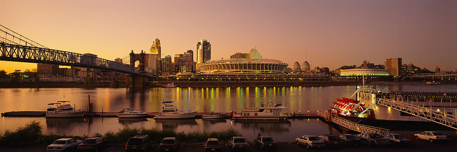 Cincinnati Photograph - Buildings In A City Lit Up At Dusk #7 by Panoramic Images