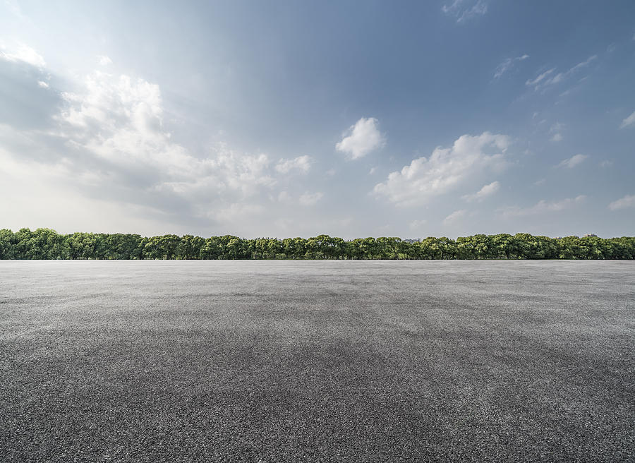 Empty Parking Lot Photograph by Copyright Xinzheng. All Rights Reserved. Empty Parking Lot Photograph by Copyright Xinzheng. All Rights Reserved.