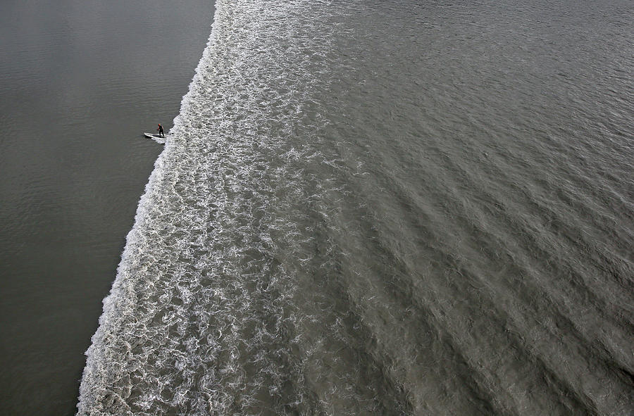 Feature - Bore Tide Surfing In Alaska #7 Photograph by Streeter Lecka