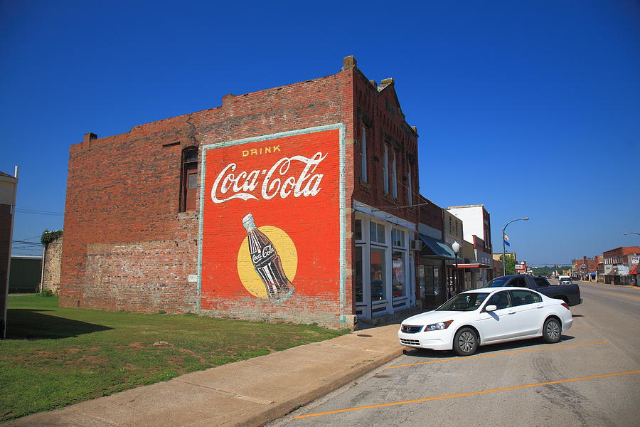 Architecture Photograph - Route 66 - Coca Cola Ghost Mural 2012 by Frank Romeo