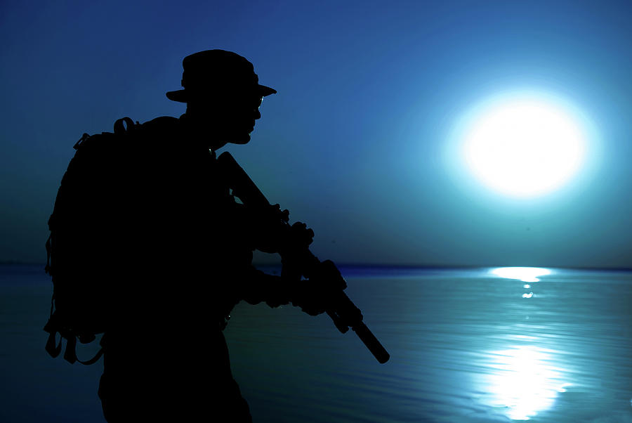 Silhouette Of Army Soldier With Rifle #7 Photograph by Oleg Zabielin