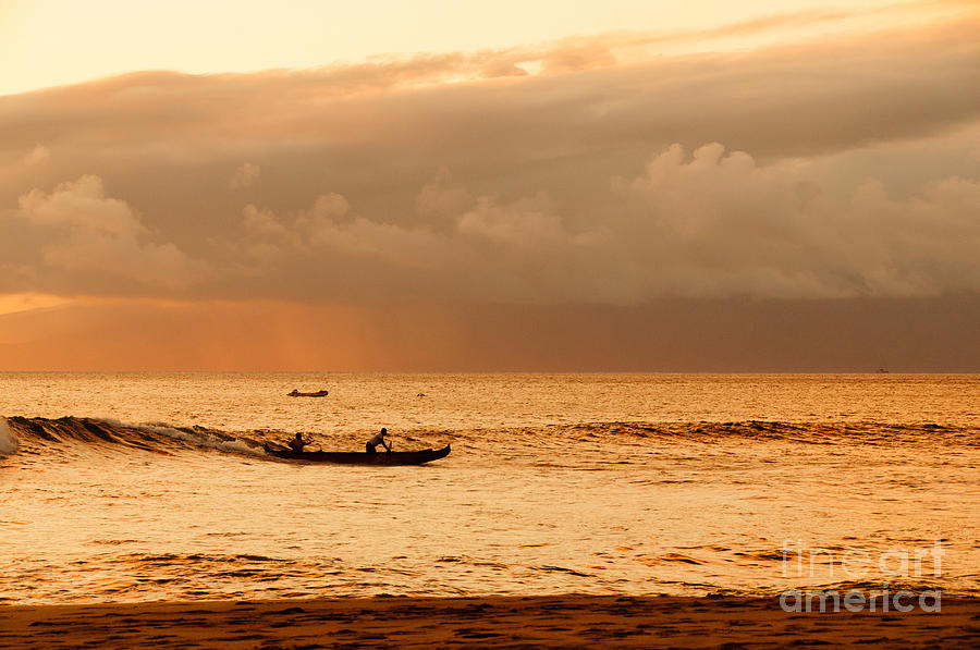 Two men paddling a Hawaiian outrigger canoe at sunset Maui Hawaii USA #7 Photograph by Don Landwehrle