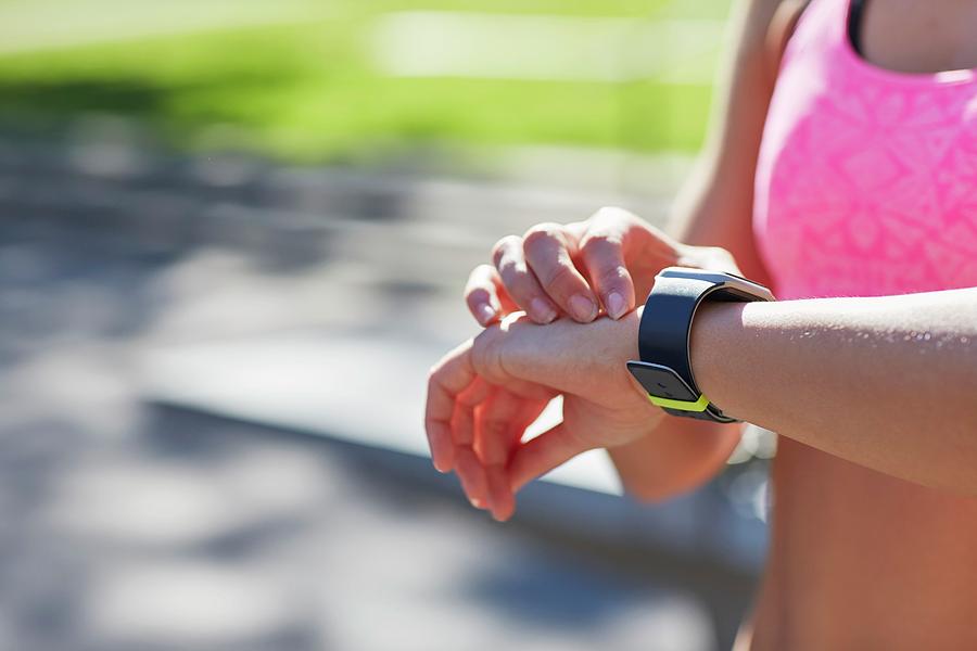 Woman Wearing Sports Watch Photograph by Science Photo Library - Pixels