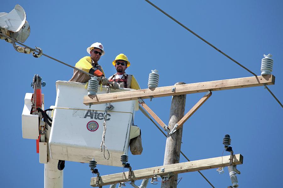 Repairing Power Lines Photograph by Jim West - Fine Art America