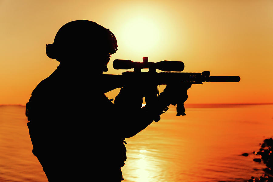 Silhouette Of Army Soldier With Rifle #8 Photograph by Oleg Zabielin