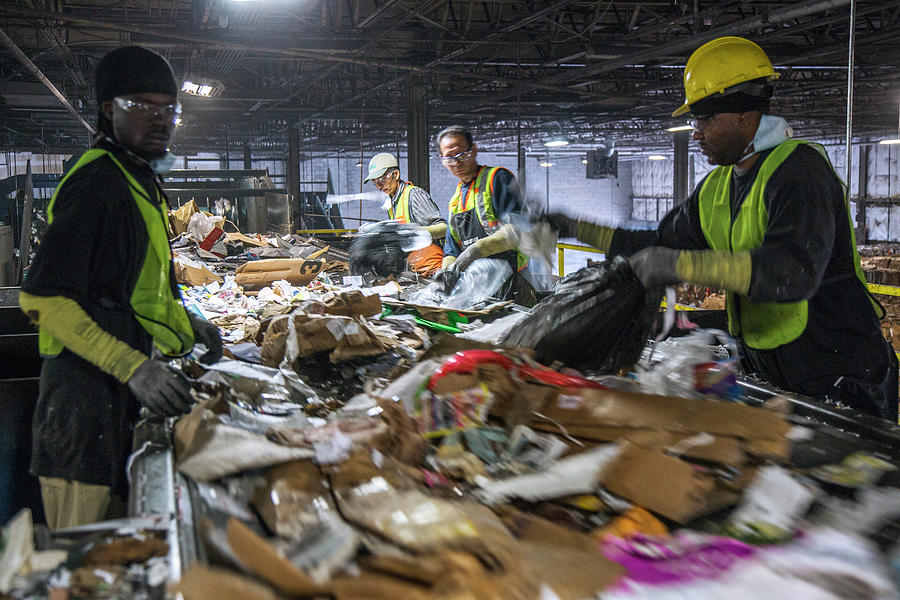 Waste Sorting At A Recycling Centre #8 Photograph by Peter Menzel