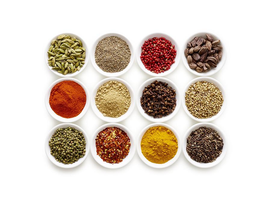 Dried spices in small bowls #9 Photograph by Science Photo Library