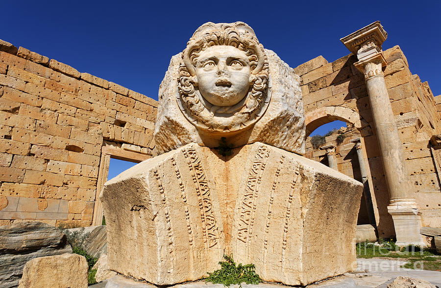Architecture Photograph - Sculpted Medusa head at the Forum of Severus at Leptis Magna in Libya #9 by Robert Preston
