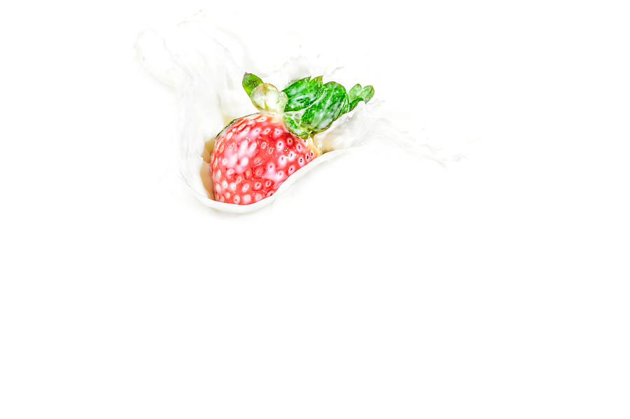 Strawberry in Milk #9 Photograph by Peter Lakomy