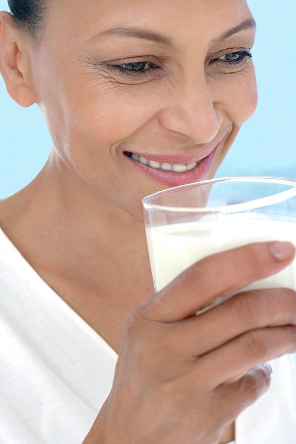 Woman Drinking Milk Photograp