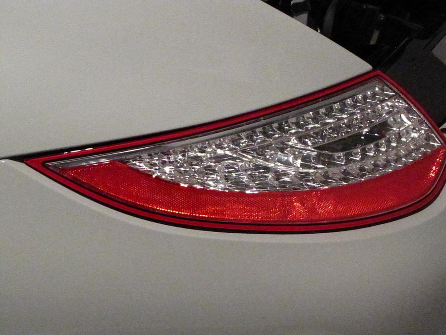 911 Taillight Photograph by Kelly Mezzapelle
