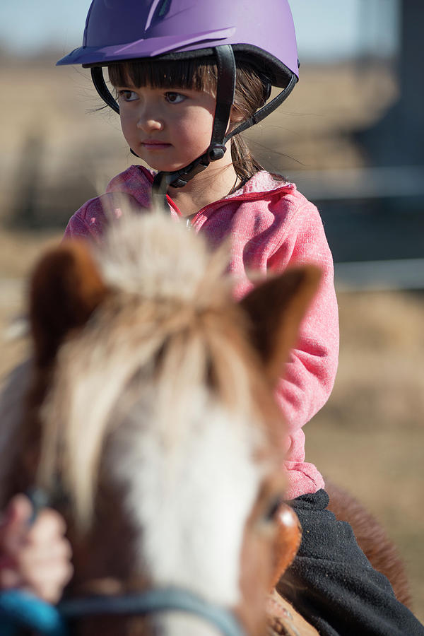 Horse Photograph - A 6 Year Old Cowgirl Rides A Little by Topher Donahue