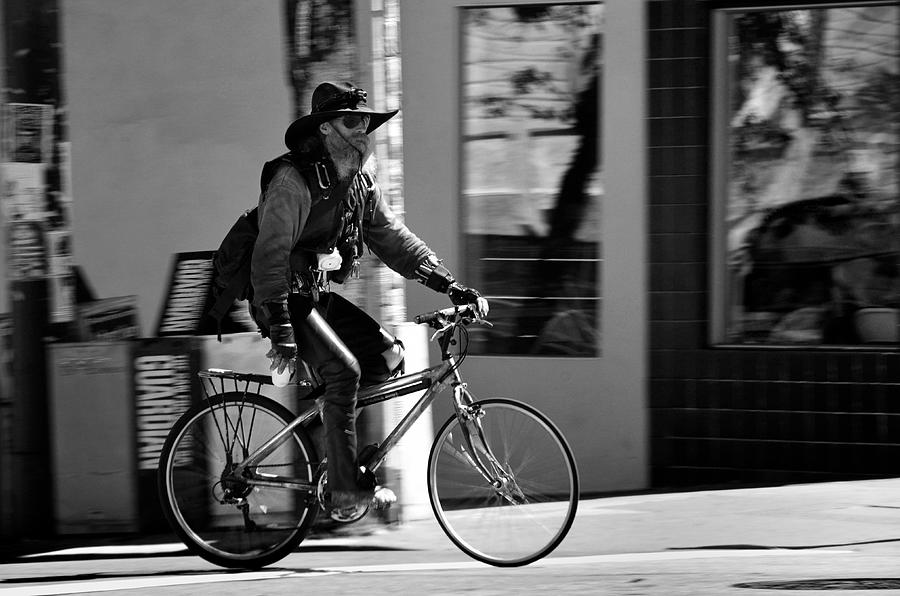 A barefoot cyclist with beard and hat in San Francisco Photograph by RicardMN Photography