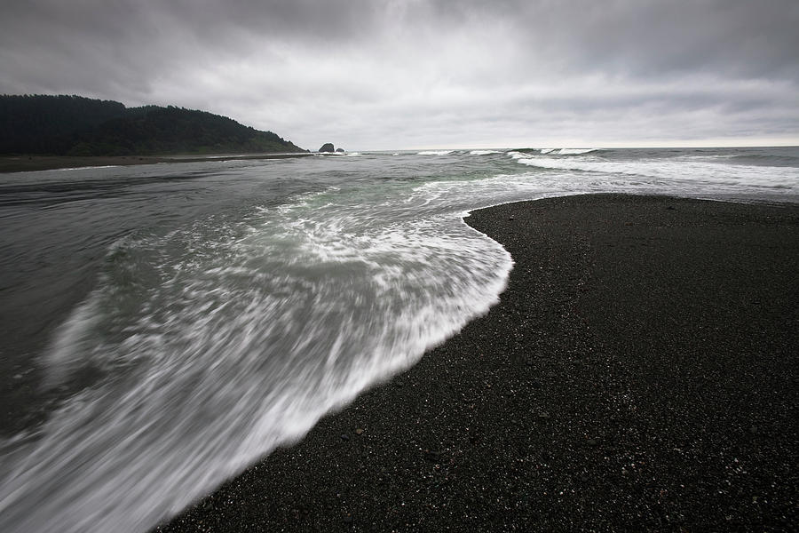 A Beach And Waves With Dark Stormy Sky Photograph by David McLain A Beach And Waves With Dark Stormy Sky Photograph by David McLain
