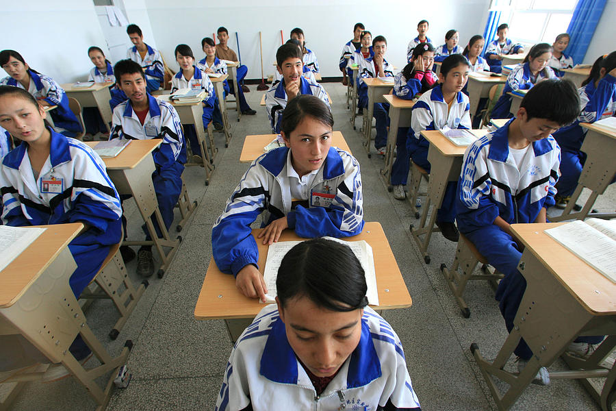 A bilingual school in Xinjiang teaches Mandarin Chinese to Uyghurs Photograph by Servais Mont A bilingual school in Xinjiang teaches Mandarin Chinese to Uyghurs Photograph by Servais Mont