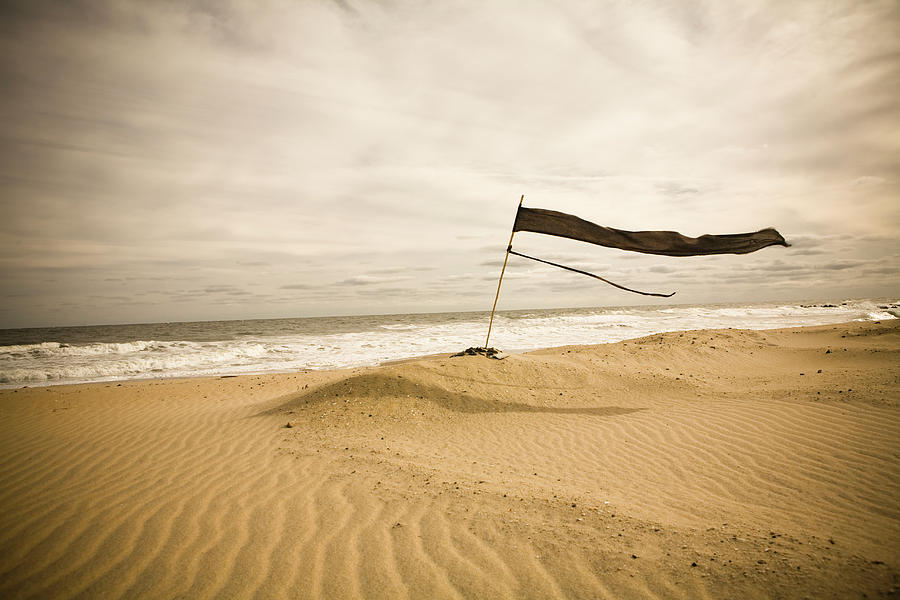 A Black Flag Blows In The Wind Photograph by Paul Giamou | Fine Art America