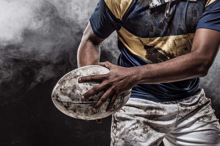 A bloody muddy Rugby Player Photograph by Lorado