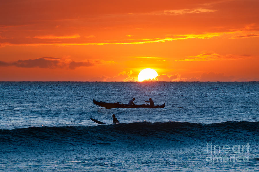 A boat and surfer at sunset Maui Hawaii USA Photograph by Don Landwehrle