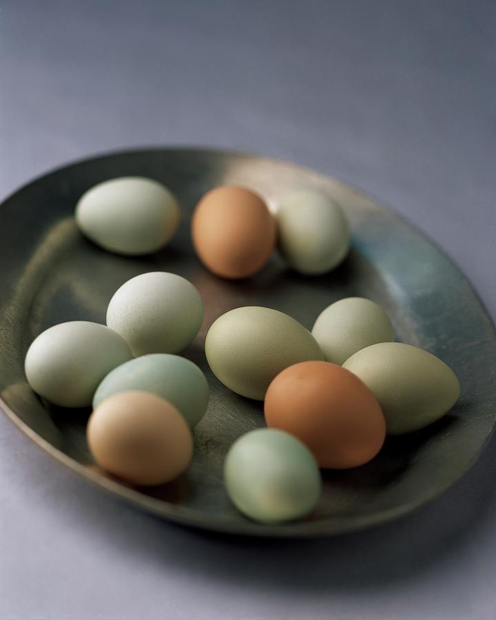 A Bowl Of Eggs Photograph by Romulo Yanes