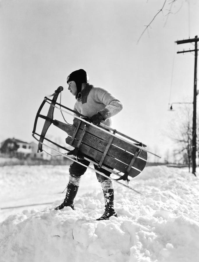 A Boy Carrying His Sled Photograph by Underwood Archives