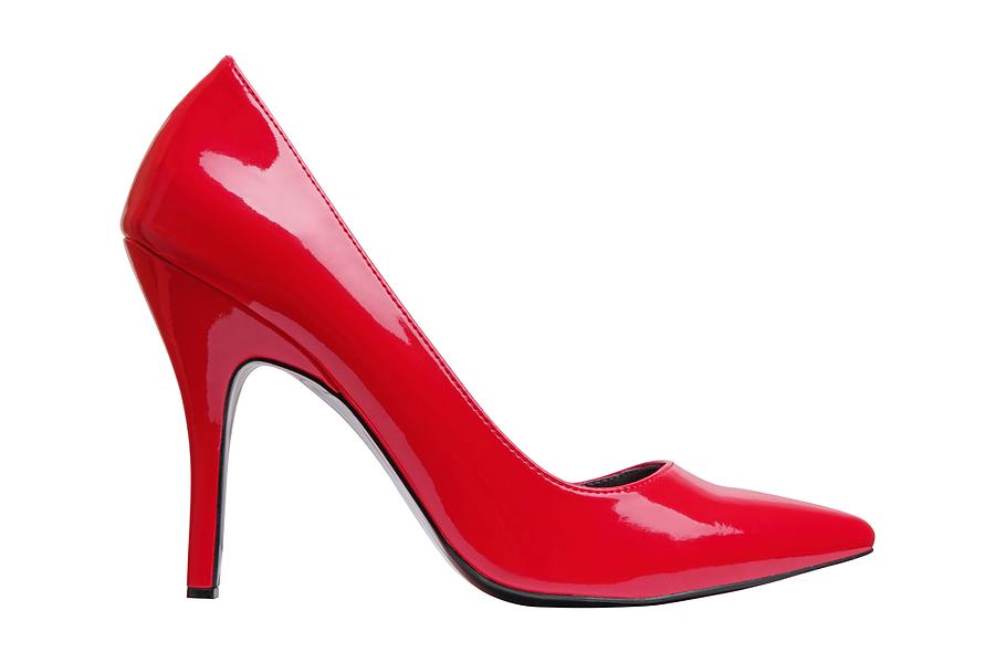 A bright red high heel womans shoe by itself  Photograph by Macroworld
