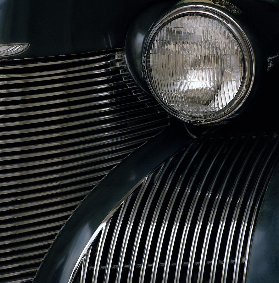 A Cadillac Headlight Photograph by Shaun Higson